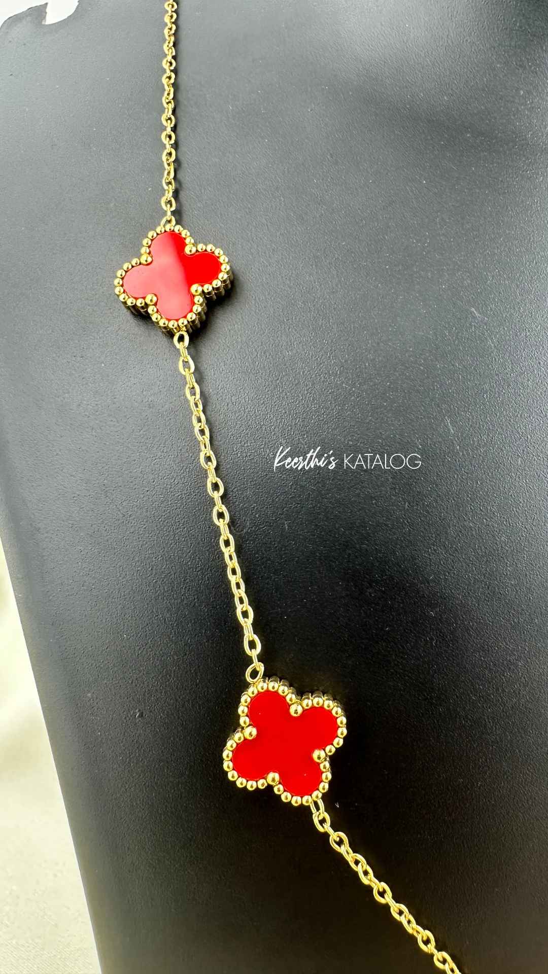 KD1010 - Ruby Clover Charm